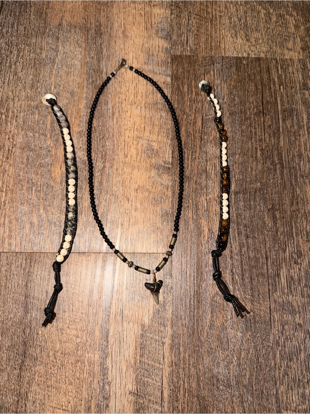 Handmade Black Beaded Necklace with Shark Tooth Pendant